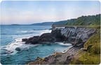 Rocky cliffs and a seaside path along the ocean